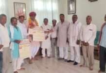 सवाई माधोपुर में सैनी-माली सामूहिक विवाह सम्मेलन के पोस्टर का विमोचन